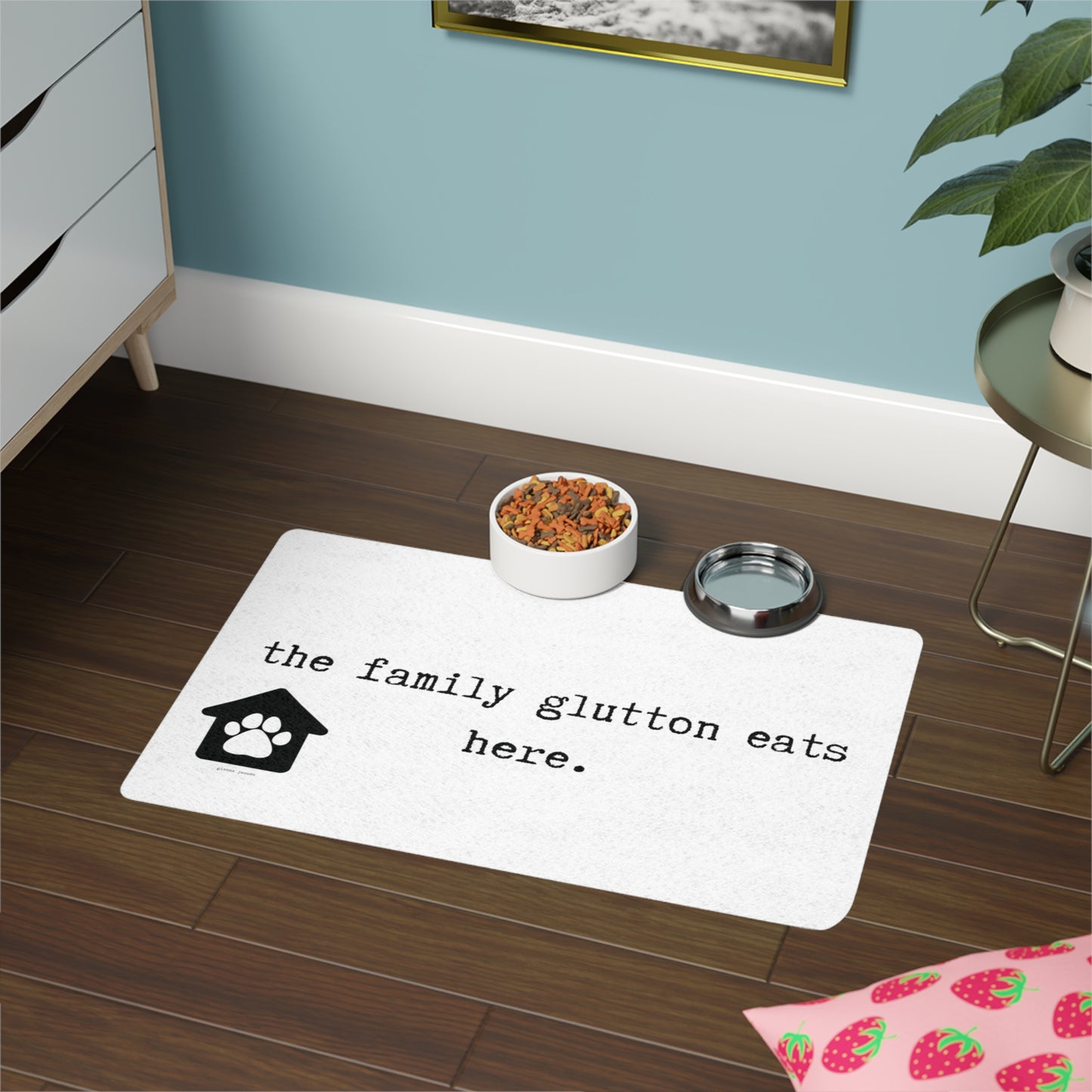 the family glutton eats here.-gianna jessen pet food mat (12x18)